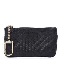 The Gucci Microguccissima Key Chain Coin Pouch In Black Is Crafted From An Embossed Calfskin Leather In Italy. This Zip Wallet Coin Pouch Features The Interlocking Gg Pattern, Gucci Logo, And Interior Key Chain. Black Microguccissima Key Chain Coin Pouch Gold-Tone Hardware 100% Calfskin Leather Top Zip Closure Embossed Microguccissima Pattern Gucci Logo Interior Key Chain 6" X 3.25" X 0.65" Chain Drop 2.75 Key Ring 1.5" X 1" Product Number 544248 Made In Italy Luxury Black Coin Purse With Interior Key Chain Holder, Elegant Black Bag With Logo Charm, Luxury Black Bag With Logo Charm, Gucci Wallets With Gold-tone Hardware For Formal Use, Gucci Wallet With Gold-tone Hardware For Formal Occasions, Gucci Wallets With Gold-tone Hardware For Formal Occasions, Gucci Black Bag As Gift, Black Gucci Bag As Gift, Louis Vuitton Clemence Wallet