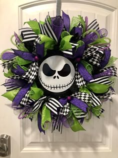 a wreath with a skeleton face on it