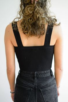 Black, thick, ribbed tank top. Cropped and the perfect basic black top for a night out. Victoria is wearing a size small. Classic Black Tank Top, Basic Black Top, Ribbed Tank Top, Black Tank Top, Top Cropped, Ribbed Tank Tops, Ribbed Tank, Black Tank, Black Top