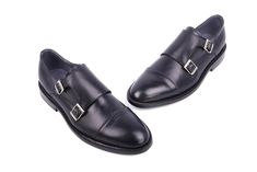 Adjustable double buckle monkstrap shoe with captoe detail at the toe. Ideal for formal or casual wear. Goodyear welt construction, leather upper and lining. Padded leather insole. Leather sole. Leather heel with rubber insert. *Can be manufactured in other colors. Please contact us for a custom quote. **The details and color in this piece may slightly vary to the ones shown, they are a result of the nature of the manufacturing process. Black Cap Toe Monk Strap Shoes, Black Cap Toe Monk Strap Shoes For Office, Semi-formal Monk Strap Shoes, Classic Black Monk Strap Shoes With Leather Footbed, Classic Monk Strap Shoes With Tang Buckle, Classic Monk Strap Slip-on Shoes With Tang Buckle, Black Monk Strap Shoes For Business With Leather Footbed, Black Monk Strap Shoes With Leather Footbed For Business, Business Black Monk Strap Shoes With Leather Footbed