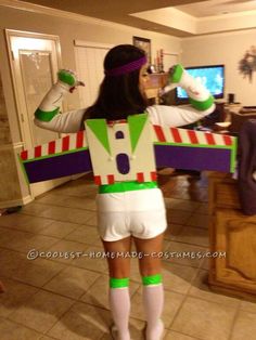 a woman dressed as buzz lightyear from toy story