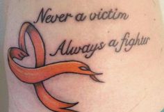 an orange ribbon with the words never a victim always a fighter