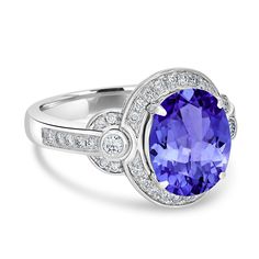 11X9mm Violetish Blue Tanzanite AAAA Ring Oval shape 3.9ct with 0.37cttw Diamond in 14K & 18K White Gold, Yellow Gold, Rose Gold. Product Information SKU TT50896-3 Metal Type Your choice: 14K, 18K Metal Color Your choice: White Gold, Yellow Gold, Rose Gold Ring Style - Metal Weight 6.01 Primary Stone Gemstone Name Tanzanite Gemstone Species Zoisite No. Of Gemstones 1 Gemstone Shape Oval Gemstone Color Violetish Blue Gemstone Grade Your choice: AA, AAA, AAAA Gemstone Clarity VVS Gemstone Total Ca Tanzanite Ring, Blue Tanzanite, 14k Rose Gold Ring, Tanzanite Gemstone, Ring Oval, Ring Style, Blue Gemstones, Metal Color, Gold Yellow