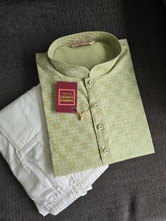 This listing is 1 full set of Kurta Pajama in specified color for Men.  Men's Kurta Pyjama with weaving work and party wear  Elegant pure cotton kurta with white pajama Kurta comes with pyjama RAMADAN, EID, VALENTINE, PONGAL, SANKRANTI, WEDDING, HALDI, MEHENDI, UGADI, LOHRI, RAKSHABANDHAN, AKSHAYTRITHYA, NAVRATRI, CHETTICHAND, ONAM Please measure your chest around and order sizes accordingly. Measurement picture of Size 44 in pictures. Dry Clean wash is recommended. Or hand wash with mild or bab Ceremonial Cotton Straight Kurta, Diwali Traditional Cotton Nehru Jacket, Pista Green Cotton Sets For Festivals, Traditional Green Cotton Nehru Jacket, Fitted Cotton Sherwani With Traditional Patterns, Ceremonial Cotton Kurta For Festivals, Cotton Kurta For Ceremonial Festivals, Traditional Fit Sets For Puja And Festivals, Traditional Pista Green Cotton Sets