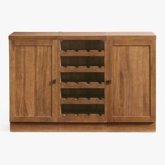 a wooden cabinet filled with lots of wine bottles