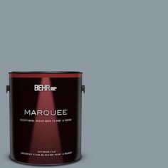 the behr marquee paint is shown in an olive green, with dark brown and