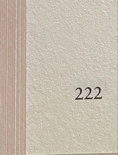 a close up of a piece of paper with the numbers 22 and 22 on it