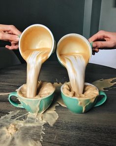 two people pouring coffee into cups on top of a wooden table, with the caption'all posts'above them