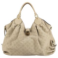 Louis Vuitton extra large cream mahina shoulder bag. Logo perforated leather and gold tone hardware. Excellent condition except minor red marks in the back, please refer to photos. Handle drop 9.5”. Comes with generic dust cover. Bag Logo, Large Hobo Bag, Red Marks, Perforated Leather, Leather Bags Handmade, Vintage Bags, White Bag, Hobo Bag, Fashion Handbags