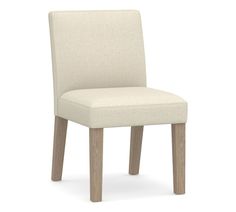 a beige upholstered chair on a white background