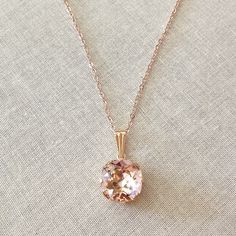 Gorgeous necklace featuring a single Swarovski cushion cut 12mm crystal in a lovely pale morganite pink color.   Pendant crystal is 12mm. Chain is 18" long. Available in rose gold, gold or silver plated metal finishes.  Please select metal finish from the drop down menu at check out. Blush Necklace, Morganite Necklace, Blush Jewelry, Prom 2023, Rose Gold Morganite, Necklace Swarovski, Pink Swarovski, Magical Jewelry, Jewelry Accessories Ideas