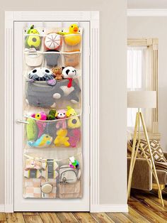 an open door with stuffed animals on it