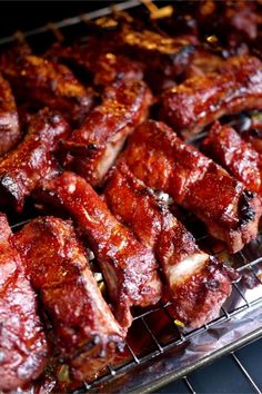 meat is being cooked on a rack in the oven