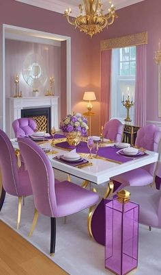 a dining room with purple chairs and a white table surrounded by gold trimmings