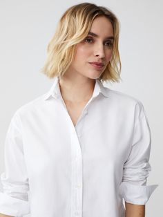 Worn by style icons of the past and present, there's something so timeless about a classic button-down shirt. Our newest addition to the line up is crafted in 100% cotton with a drop shoulder that's somewhere between structured and relaxed. For a menswear-inspired look, cuff the sleeves. | J.McLaughlin Women's Finn Shirt White, Size Medium | Cotton Classic Oversized Shirt For Daywear, Classic Oversized Tops For Workwear, Oversized Classic Tops For Business Casual, Timeless Collared Shirt For Daywear, Timeless Spring Shirt With Spread Collar, Classic Oversized Blouse, Oversized Classic Blouse, Oversized Classic Blouse For Business Casual, Classic Oversized Shirt With Fold-down Collar