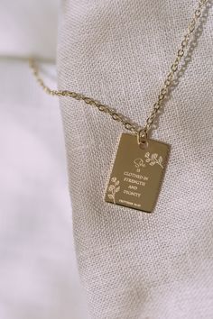 "Introducing Our \"Strength and Dignity\" Necklace 🌟 Embrace Confidence and Grace 🌟 Elevate your spirit and style with our exquisite \"Strength and Dignity\" necklace, inspired by Proverbs 31:25. This timeless piece of faith and fashion carries the profound scripture, \"She is clothed with strength and dignity, and she laughs without fear of the future.\" It's a daily reminder that strength, dignity, and boundless joy are yours to claim. 🌼 Key Features: 🌼 Inspirational Scripture: Engraved wi Christian Necklace Aesthetic, Gold Christian Jewelry, Christian Jewelry Aesthetic, Pretty Bibles To Buy, Necklace Engraving Ideas, She Is Clothed In Strength And Dignity, Bible Necklace, Christian Necklaces, Christian Jewelry For Women