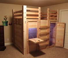 a loft bed made out of wooden pallets