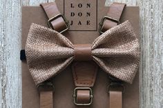 Classic Suspenders For Suit And Tie At Party, Classic Bow Tie With Suspenders For Party, Classic Party Bow Tie With Suspenders, Dapper Suspenders For Party, Dapper Party Suspenders, Elegant Fitted Belts And Suspenders With Bow, Fitted Belts And Suspenders With Bow For Party, Adjustable Dapper Belts And Suspenders For Party, Classic Brown Belts And Suspenders For Wedding