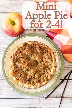 an apple pie on a plate with the words mini apple pie for 2 - 4