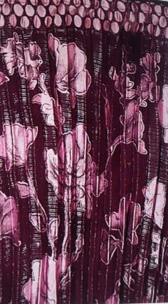 an image of a curtain with flowers on it in purple and pink colors, close up