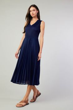 This sleeveless midi dress is all about tonal texture contrast. On top, it's a figure-hugging rib knit. From the waist down, you've got a semi-sheer woven skirt with crisp pleats. Perfection together. •Mixed-fabric design •V-neck knit top •Semi-sheer woven skirt •Pleated •Mid-length hem DIMENSIONS •Standard: 47" Length Item number 2490137 100% Polyester Elegant Stretch Ribbed Sleeveless Dress, Elegant Sleeveless Ribbed Maxi Dress, Elegant Fitted Sleeveless Ribbed Dress, Sleeveless Ribbed Midi Dress For Evening, Evening Sleeveless Ribbed Midi Dress, Fitted Ribbed Sleeveless Midi Dress, Sleeveless Ribbed Dresses For Date Night, Elegant Ribbed Sleeveless Dress For Spring, Sleeveless Ribbed Midi Dress For Date Night