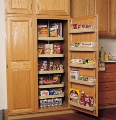 an organized pantry with lots of food in it