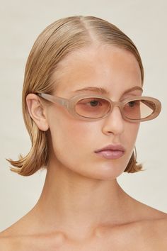 The Lima are polarized, ‘90s inspired, oval sunglasses with beige, translucent frame and beige lenses. Sunglass case and cleaning cloth included. Sunglasses For Blind People, Mason Thames With Sunglasses, Sunglasses Ss23, Creative Sunglasses, Beige Sunglasses, 170 Pounds, Devon Windsor, Mens Measurements, Blonde Women