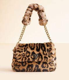 Guess Samia Leopard Purse - Brown , Women's Leopard Printed faux fur lined purse Foldover magnetic snap closure Interior zipper and card pouch pockets Removable shoulder strap Dimensions: 8 1/2(L) x 2(W) x 6(H). Shell: 100% Polyester. Trim: 100% Polyurethane. Lining: 80% Polyester 20% Cotton. Apparel & Accessories > Handbags, Wallets & Cases > Handbags Leopard Print Accessories, Leopard Purse, Leopard Bag, Guess Bags, Card Pouch, Wallet Case, Handbag Accessories, Pocket Pouch, Apparel Accessories