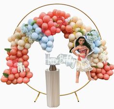 an image of a woman in front of a birthday wreath with balloons and flowers on it