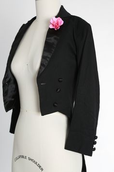 "RARE Antique Vintage museum quality 1920s boys wool tuxedo suit tails Cropped fit with satin collar and bright pink satin flower pin Satin buttons with single satin button closure Wool tuxedo pants with metal zipper, side pockets & 2 back pockets (pockets lined in cotton) Excellent condition! Made very well M e a s u r e m e n t s: Size: unsure on childs size, please see all measurements for accurate fit. All taken while garment is laying flat Blazer: --------------------------- Bust: 14 1/ Elegant Fitted Suits For Costume, Fitted Party Tuxedo With Buttons, Elegant Fitted Tuxedo For Costume, Fitted Party Tuxedo, Classic Fitted Blazer For Costume, Fitted Classic Blazer For Costume, Elegant Fitted Blazer For Costume, Tuxedo With Tails