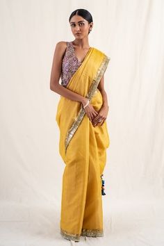 Yellow silk chanderi tissue saree with multicolour heavy tassled palla. Comes with an unstitched blouse piece. - Aza Fashions Yellow Chanderi Pre-draped Saree With Pallu, Transitional Yellow Chanderi Pre-draped Saree, Transitional Yellow Tissue Silk Pre-draped Saree, Semi-stitched Yellow Pre-draped Saree In Art Silk, Yellow Tissue Silk Pre-draped Saree With Zari Weaving, Border Saree, Tissue Saree, Yellow Saree, Yellow Silk