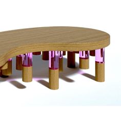 a wooden bench with pink metal legs on it's sides and a white background