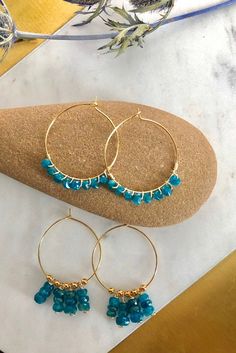 Elegant Blue Apetite Stones beaded and dangle in either choice of silver plated hoops, sterling silver hoops, gold plated hoops, or 14k gold filled hoops. Perfect bohemian jewelry, perfect size and dangle. Super gorgeous with boho outfits. Light and comfortable. Make a statement today! 💜Simple, Dainty and Elegant Raw Natural Stones for everyday wear that's lasting. Simple yet elegant especially the shine and color are so gorgeous.The picture does not do it justice it and is much prettier in per Blue Small Hoop Jewelry With Dangling Beads, Blue Small Hoop Earrings With Dangling Beads, Blue Wire Wrapped Sterling Silver Hoop Earrings, Blue Sterling Silver Wire Wrapped Hoop Earrings, Bohemian Blue Wire Wrapped Hoop Earrings, Handmade Blue Apatite Earrings, Blue Bohemian Hoop Earrings With Natural Stones, Bohemian Blue Hoop Earrings With Natural Stones, Nickel-free Apatite Dangle Jewelry