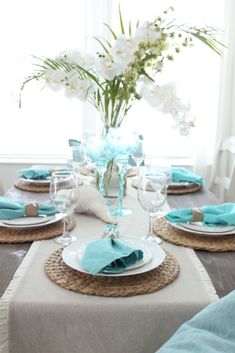 the table is set with place settings for four