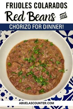 a white bowl filled with red beans and garnished with parsley on top