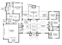 the floor plan for a home with two master suites and an office on one side