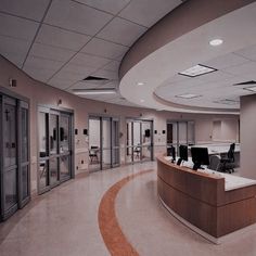 an empty office with desks and chairs