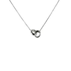 A beautiful and iconic "love lock", our interlocking rings necklace is both practical and glamorous. Made of Italian .925 sterling silver. Polished finish. Features two small circular rings that are connected in an infinite arrangement. A necklace that exemplifies sophistication and elegance. Wear casually or dress this necklace up with sterling silver stud earrings. 16 inch plus 2 inch extender Measurements: rings; .37 inch each; 16 inch plus 2 inch extender Material 925 sterling silver Modern Sterling Silver Infinity Jewelry, Timeless Sterling Silver Necklace With Spring Ring Clasp, Sterling Silver Open Circle Fine Jewelry, Formal Sterling Silver Necklace, Open Circle Silver Wedding Jewelry, Sterling Silver Link Necklaces For Anniversary, Anniversary Sterling Silver Link Necklaces, Sterling Silver Open Circle Jewelry For Formal Occasions, Sterling Silver Open Circle Formal Jewelry