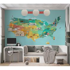 a map of the united states painted on a wall in a living room with blue walls