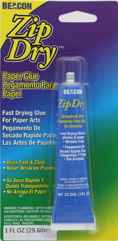 a tube of blue glue in the packaging for zip dispenser repair tape