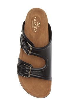 An understated VLOGO details this double-band slide sandal crafted of smooth calfskin leather and furnished with an anatomically contoured footbed. Adjustable straps with buckle closure Leather upper and lining/synthetic sole Made in Italy Designer Shoes Mens Sandals, Slide Sandals, Valentino Garavani, Designer Shoes, Calf Skin, Adjustable Straps, Leather Upper, In Italy, Nordstrom