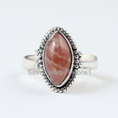 Natural Stone Ring, Real Rhodochrosite Ring, Sterling Ring, Pink Ring ,Boho Silver Ring , Statement Rings , Rhodochrosite Jewelry ----------------------------------------------------------------------------------------------------------------------------------------------------Metal: Solid 925 Sterling SilverStone Detail :Rhodochrosite Size- 6X12 mmShape- Marquise Cabochon Weight :  3.50  Gram Approx.------------------------------------------------------------------------------------------------ Bohemian Sterling Silver Opal Ring With Natural Stones, Bohemian Opal Ring With Natural Stones In Sterling Silver, Handmade Bohemian Opal Ring For Healing, Bohemian Handmade Opal Healing Ring, Bohemian Adjustable Opal Healing Ring, Bohemian Adjustable Cabochon Opal Ring, Bohemian Moonstone Ring, Bohemian Opal Ring With Natural Stones For Gift, Adjustable Bohemian Opal Ring