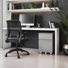 an office with a desk, chair and computer monitor on the shelf next to it