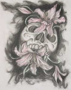 a drawing of a skull with flowers on it