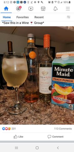 an image of alcohol on the counter with bottles and glasses next to it, including lemonade