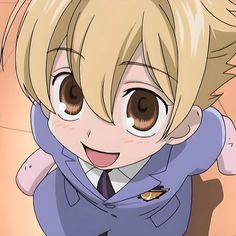 an anime character with blonde hair and big eyes