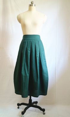 " *Elastic waist *Pleated skirt *two pockets at each side *Length approx 80cm/31.5\" *Wash by hand or machine with cold water Auailable in women's us size XXS to 3XL as well as custom size and plus size  XXS: Waist:66cm/26\" Length:80cm/31.5\" XS: Waist:70cm/27.5\" Length:80cm/31.5\" S: Waist:74cm/29\" Length:80cm/31.5\" M: Waist:78cm/30.5\" Length:80cm/31.5\" L: Waist:82cm/32\" Length:80cm/31.5\" XL: Waist:86cm/33.8\" Length:80cm/31.5\" XXL: Waist:90cm/35.5\" Length:80cm/31.5\" 3XL: Waist:94cm/ Custom Skirt, Long Linen Skirt, Linen Midi Skirt, Skirt Linen, Cream Skirt, Handmade Skirts, Skirt Summer, Skirt For Women, Brown Skirts