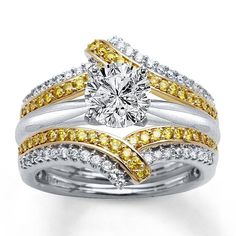 two tone gold and silver wedding ring set with yellow and white diamonds on each band