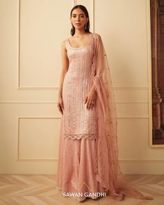 SAWAN GANDHI on Instagram: "I N A A Y A Seen here: Rose gold vertical mirror, sequins and cutdana work kurta paired with hand embroidered sharara pants and an embroidered dupatta. ιηααуα is Sawan Gandhi’s Festive ‘22 collection - a reflection of rich, handcrafted experience in the world of couture. A collection comprising heavy yet fuss free lehenga sets, cocktail sarees, sherwanis and kurta sets, ιηααуα embodies style and sensibilities. Collection available exclusively at our Mehrauli store Sleeveless Kurti Designs, Mirror Work Suit, Sawan Gandhi, Vertical Mirror, Pink Sharara, Pink Kurti, Diwali Dresses, Kurta Sharara Set, Stylish Kurtis Design