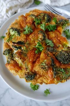 a close up of a plate of food with broccoli